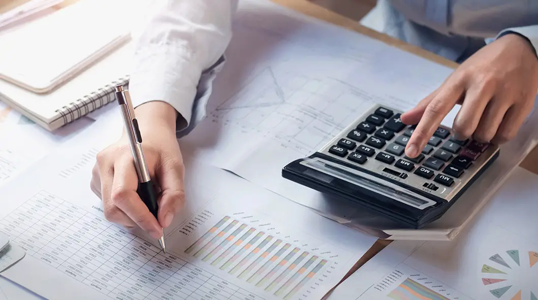 finance and accounting concept. business woman working on desk u